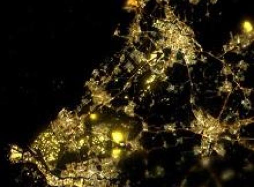 Verlichting in  Nederland van bovenaf gezien bij nacht